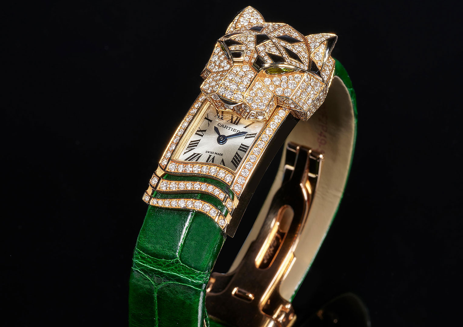 Panthers are a recurring motif in Cartier's incredible gem-set watches. Image courtesy of Bonhams