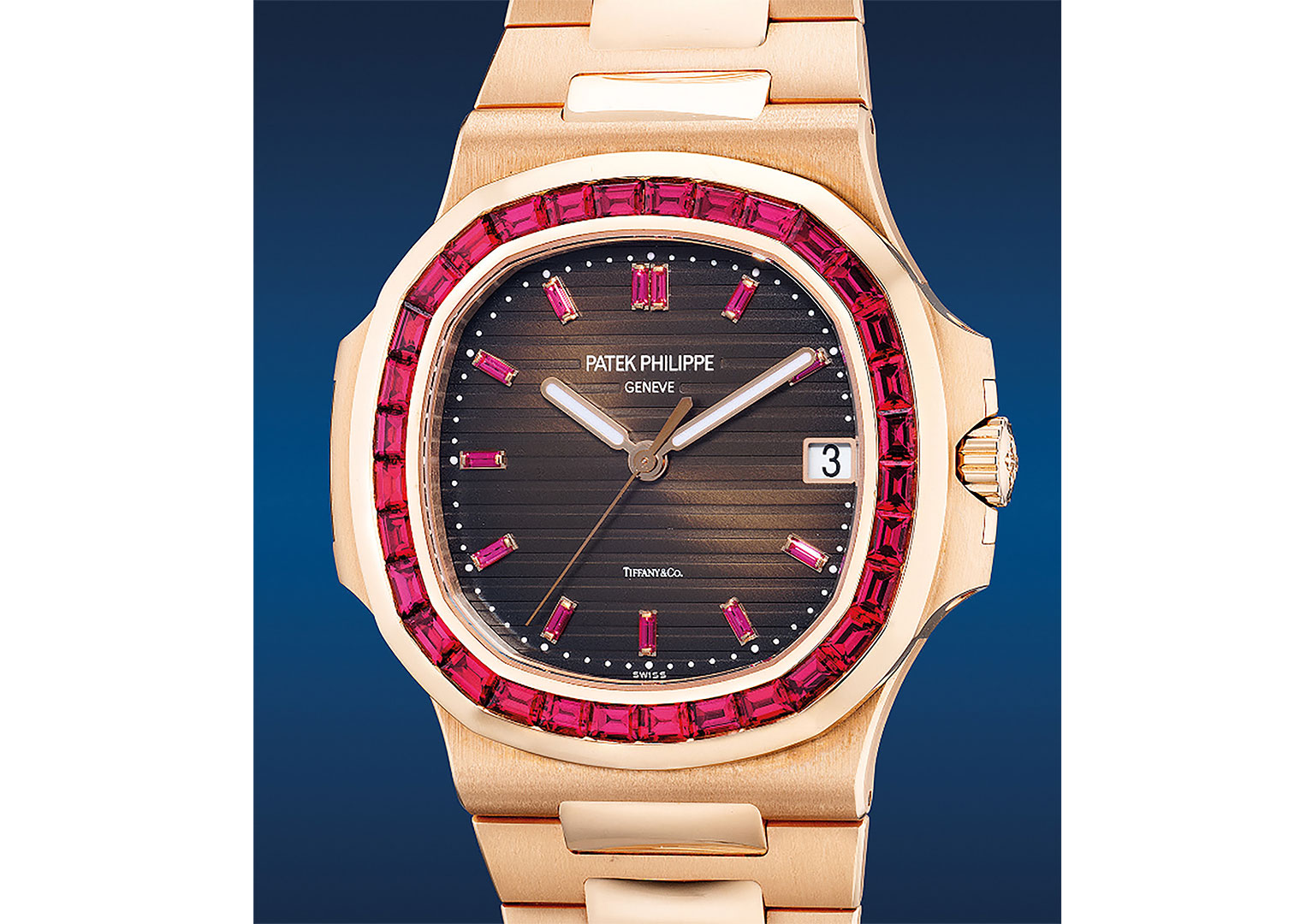 A pink-gold Nautilus with Tiffany & Co dial and baguette-cut ruby bezel. Image courtesy of Phillips